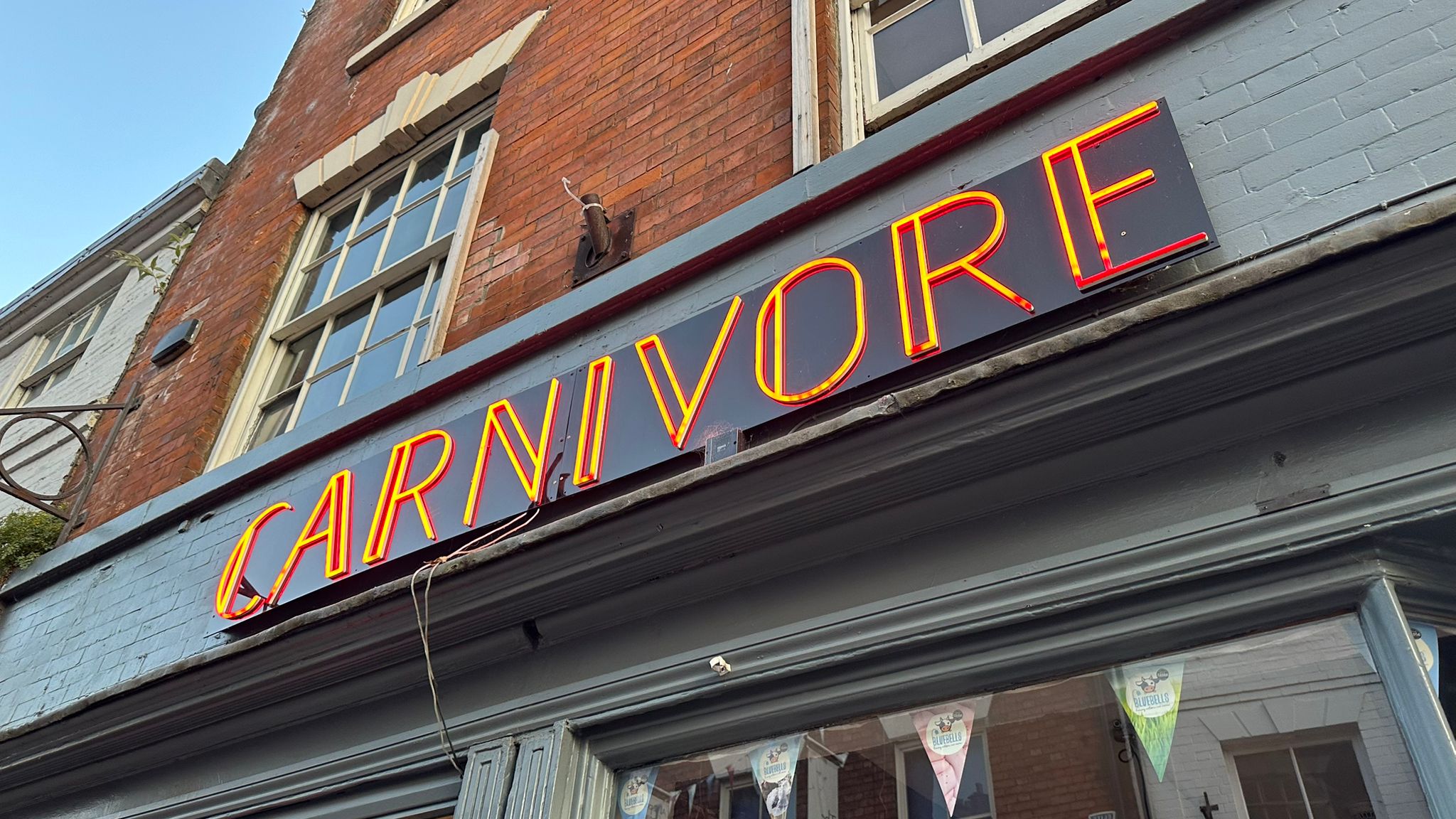 carnivore sadler gate derby neon sign